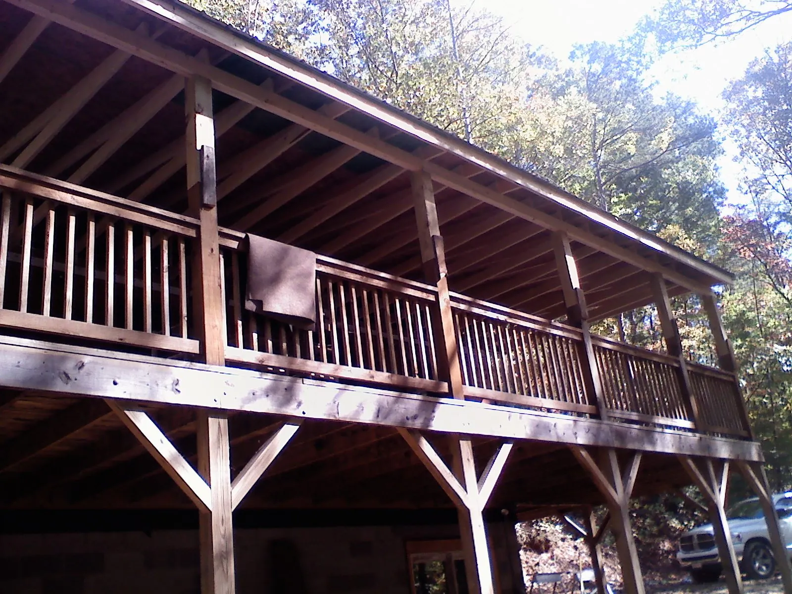 Timber framing under a new elevated porch and deck — Roof Leak Repair in Merritt Island by Roofing Brothers